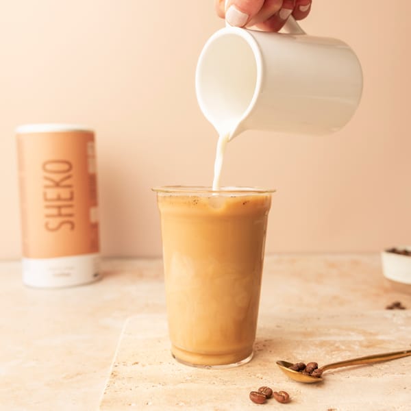 Pour the Iced Glow Coffee from the blender into a glass.