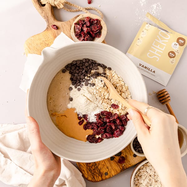 Stir the dough for the oat cookies