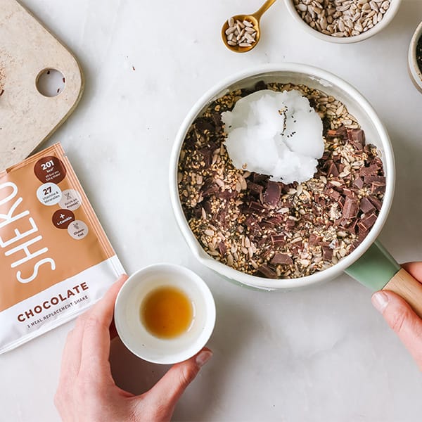 Stir the dough for the oat cookies