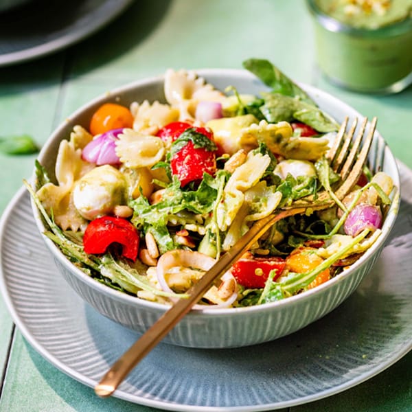 Mix pasta salad with pesto