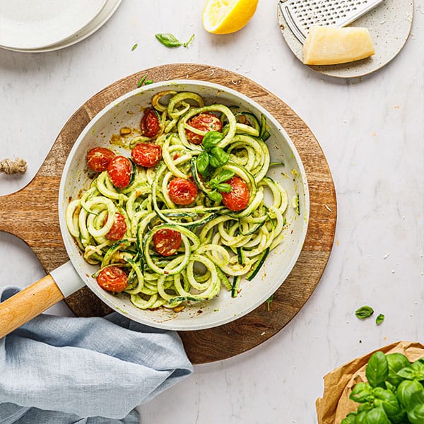 Zoodles with avocado cream and tomatoes
